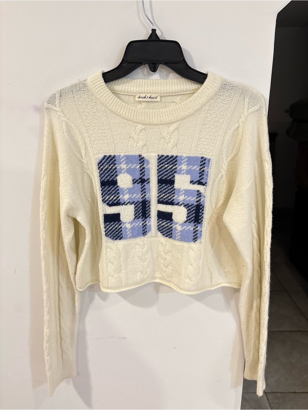 Derek Heart Cream Cable Knit Cropped Sweater with Blue Plaid '95' Applique